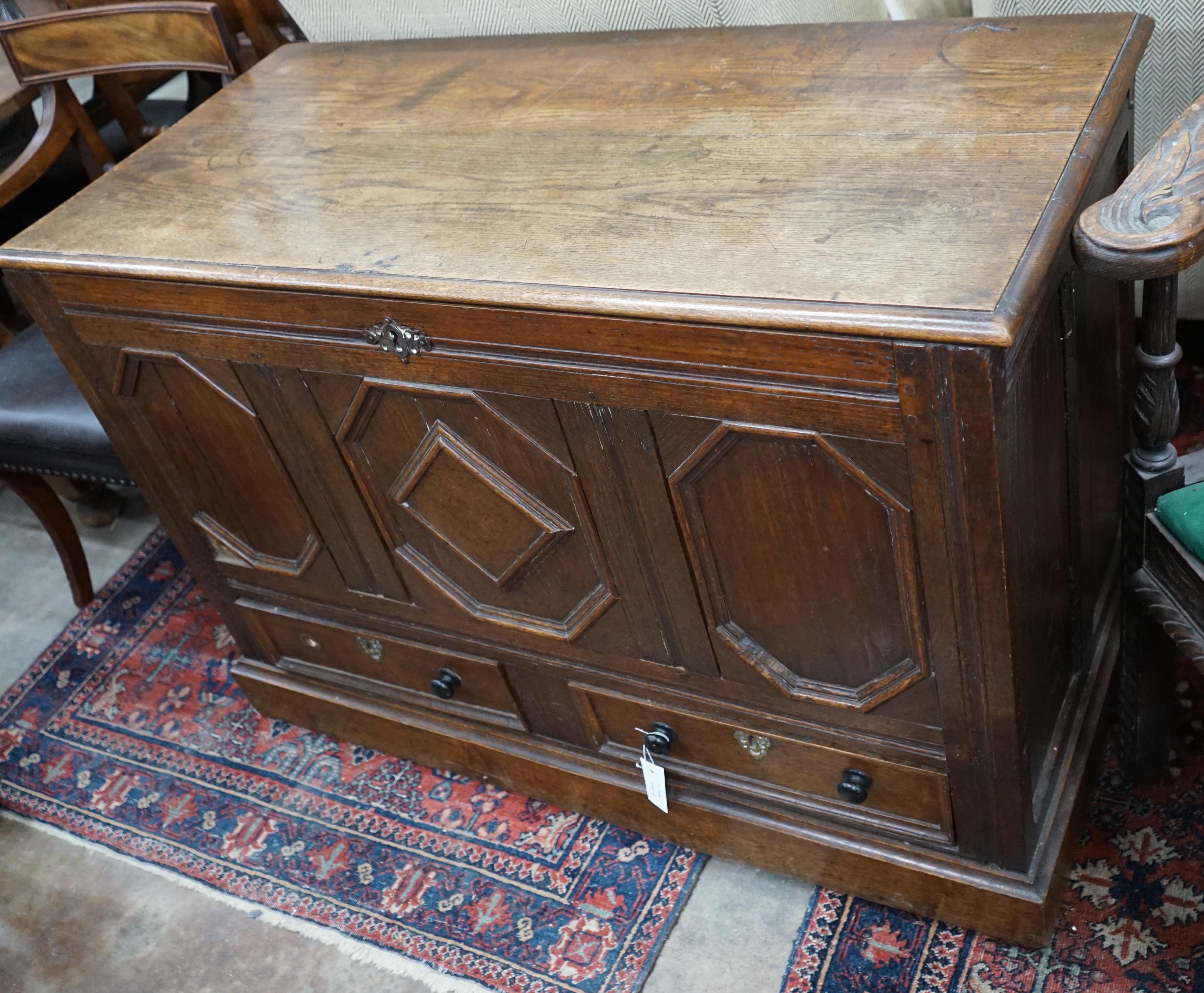 An 18th century oak mule chest, width 119cm depth 56cm height 81cm